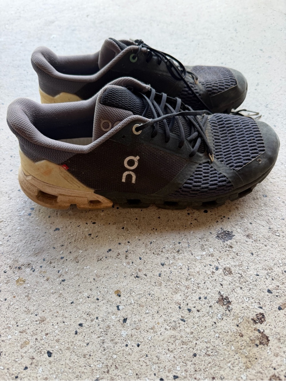 On Running Men’s Athletic Shoes in Black and white Accents
